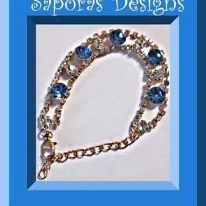 Gold Tone Bracelet With Blue & Clear Crystals For Women/Teens